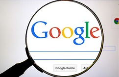 Google search logo with magnifying glass.